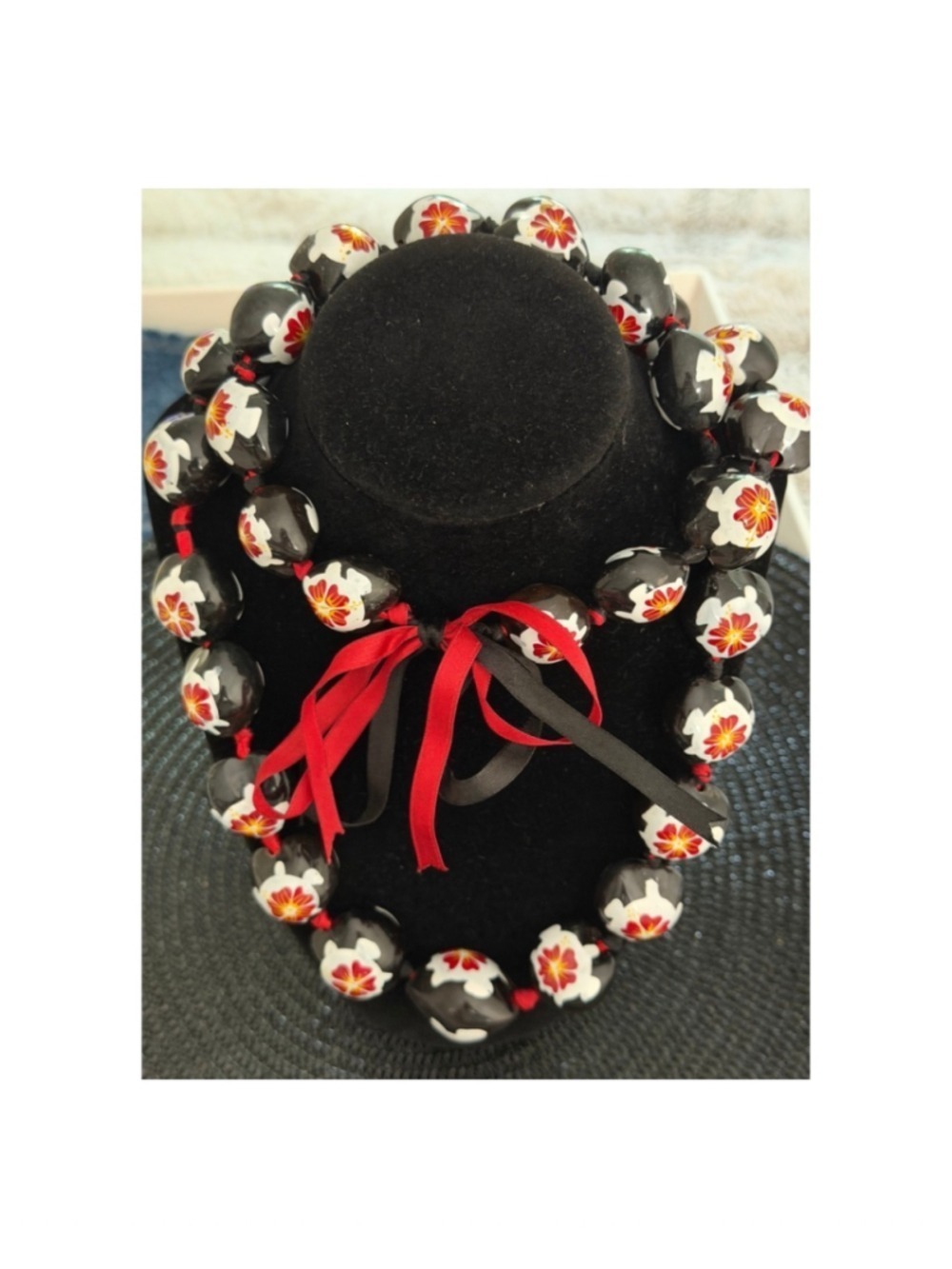 Black, White, & Red Hawaiian-style Lei with Ribbon Ties.